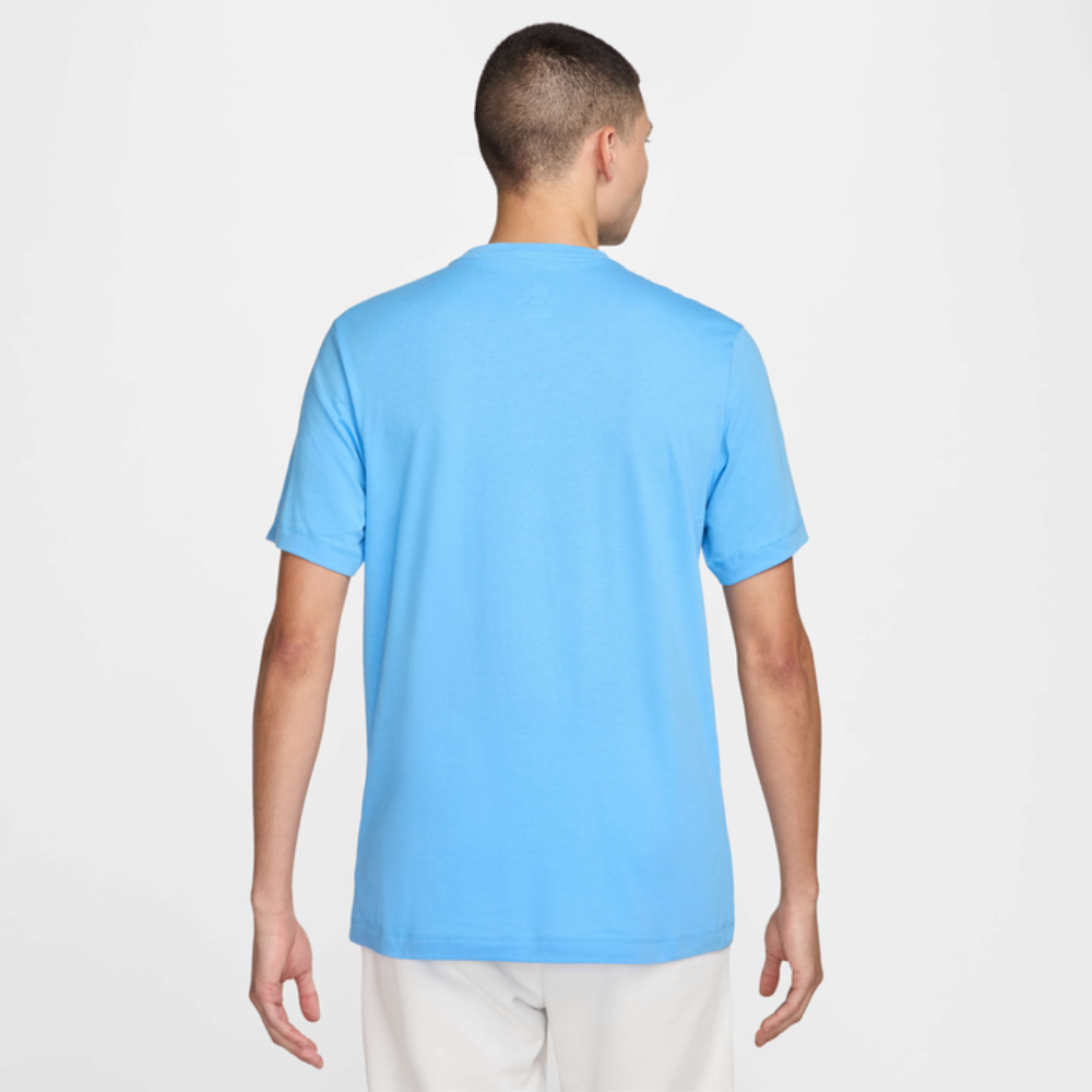 Man wearing a light blue t-shirt on a white background
